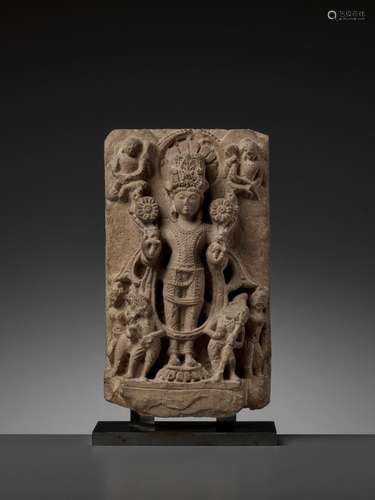 AN INDIAN SANDSTONE STELE OF SURYA, MEDIEVAL PERIOD