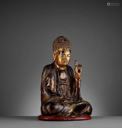 A VIETNAMESE GILT-LACQUERED WOOD STATUE OF BUDDHA