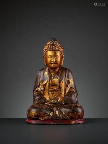 A MASSIVE GILT-LACQUERED WOOD FIGURE OF BUDDHA, 17TH-18TH CENTURY