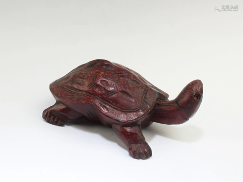 A Carved Wooden Tortoise -Shaped Ornament