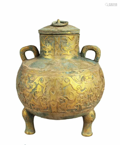 A Bronze Tripod Jar With Lid