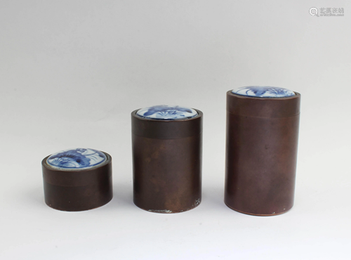 A Group of Three Bronze Round Containers