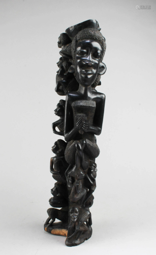 A Carved Zitan Figurine