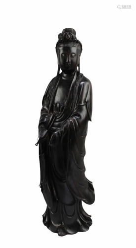 A Carved Zitan Standing Guanyin Statue