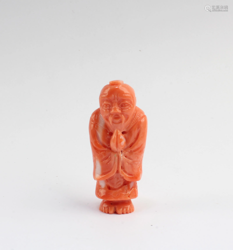 A Carved Coral Figurine