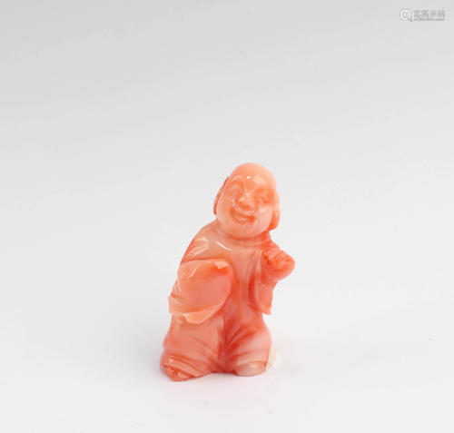 A Carved Coral Figurine