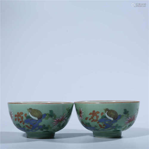 A pair of pink colored flower and bird pattern bowls in Qing Dynasty
