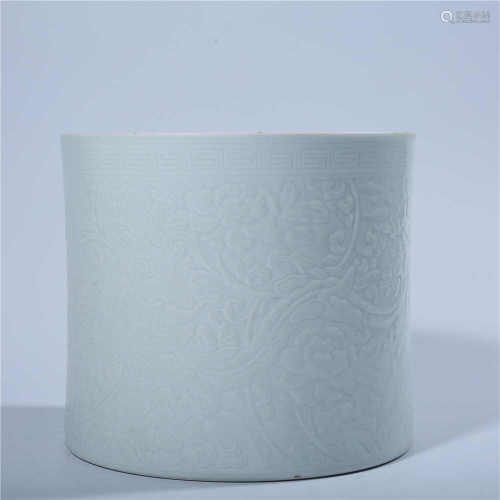 White glaze relief pen holder in Qing Dynasty