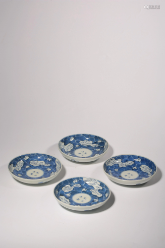 A Set of Blue and White Plates