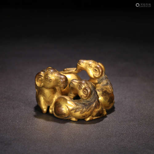 A Gilt-bronze Three Rams Ornament