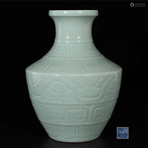 A Moulded Celadon Glazed Porcelain Vase