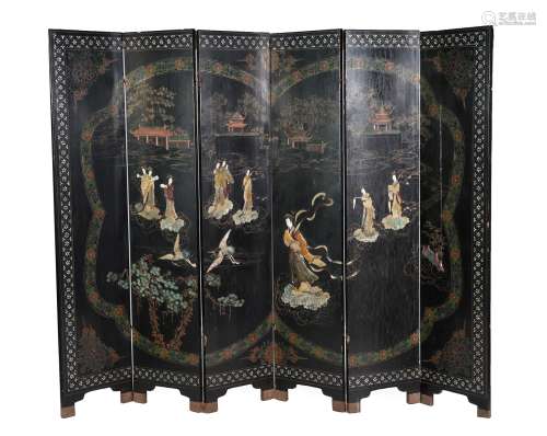 ^ A Chinese Lacquer Six-Fold Screen, late 19th/early 20th century, inlaid in ivory and hardstones