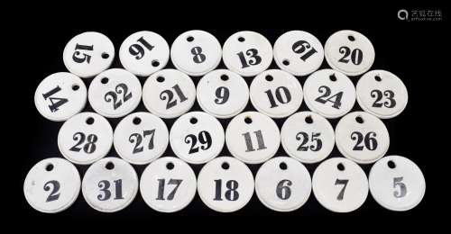 ~ A Set of Twenty-Eight Creamware Bin Labels, 19th century, of circular form, painted in black
