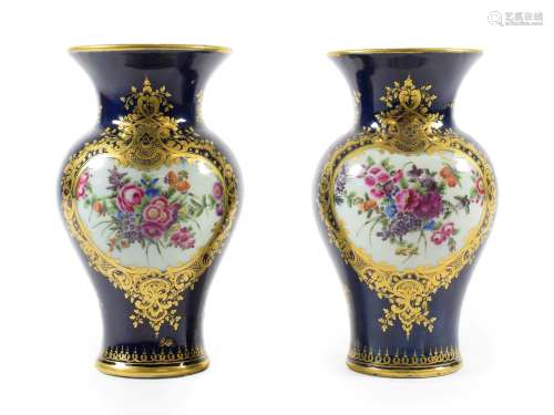 A Pair of Worcester Porcelain Vases, circa 1770, of baluster form with trumpet necks, painted with