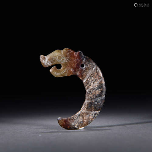 A Dragon-shaped Jade Pendant