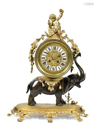 An Ormolu and Bronze Striking Elephant Mantel Clock, circa 1890, surmounted by a cherub, bronze