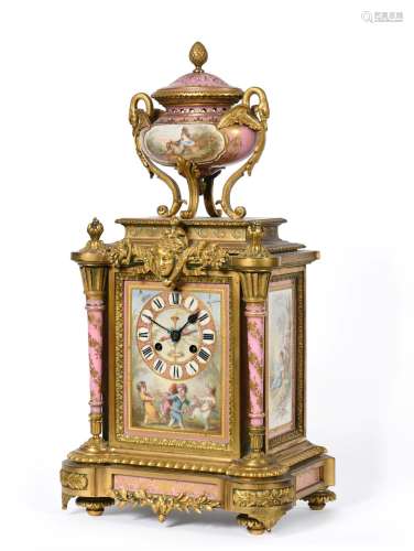 A Gilt Metal Pink Porcelain Mounted Striking Mantel Clock, circa 1890, surmounted by a swan