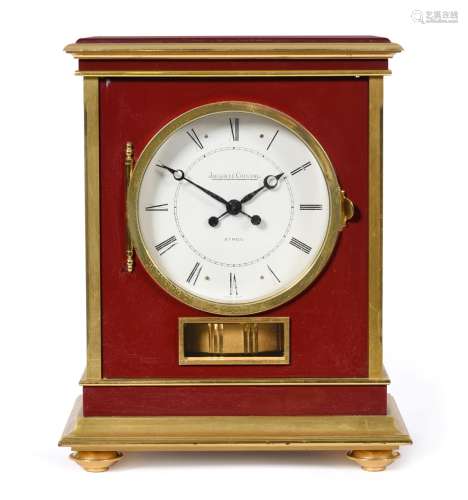 A Brass and Red Lacquered Atmos Clock, signed Jaeger LeCoultre, model: Embassy, 20th century, case