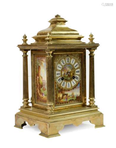 A Brass and Porcelain Mounted Striking Mantel Clock, circa 1890, caddy pediment with four turned