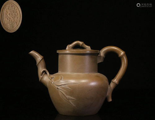 A YIXING TEAPOT AND COVER