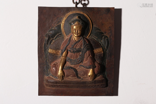 A GILT-BRONZE LAMA WALL PLAQUE.QING PERIOD