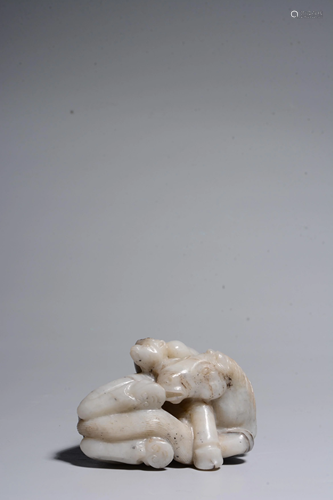 A CARVED WHITE JADE HORSE GROUP.QING PERIOD