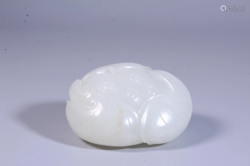 A CARVED WHITE JADE LOTUS