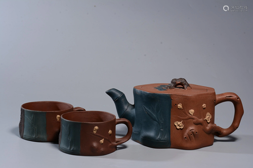 A SET OF YIXING TEAPOT AND CUPS