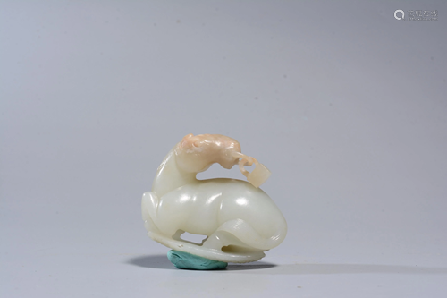 A CARVED WHITE JADE HORSE.REPUBLIC PERIOD