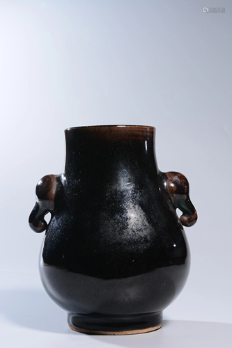 A BLACK-GLAZED VASE