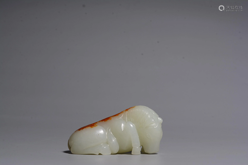 A CARVED WHITE JADE HORSE