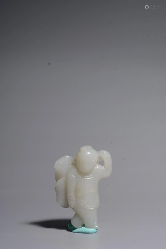 A CARVED WHITE JADE BOY