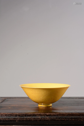 A CARVED YELLOW-GROUND 'DRAGON' BOWL.MARK OF DAOGU…