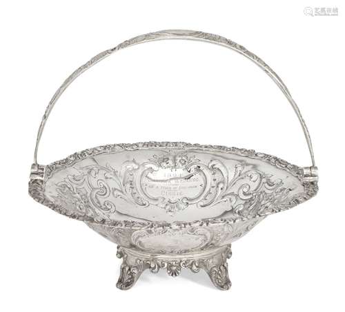 A Victorian silver swing-handled cake basket, London, c.1843, maker's mark rubbed, raised on four