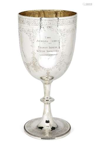 A large Victorian silver goblet, London, c.1883, Charles Stuart Harris, decorated with bright-cut