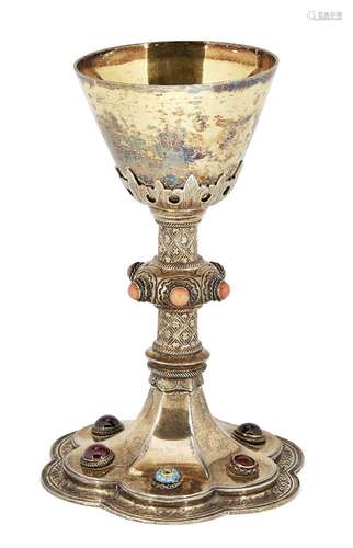 A Victorian silver gilt chalice, London, c.1898, Lambert & Co., the scalloped foot designed as a