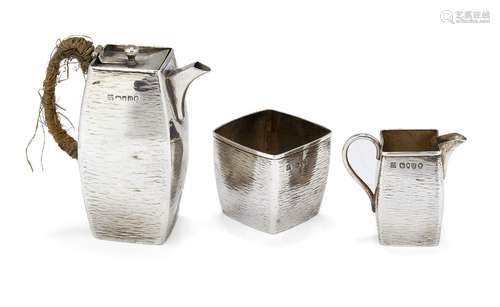 A Victorian silver three-piece bachelor's tea set, London, c.1883, Jonathan Wilson Hukin & John