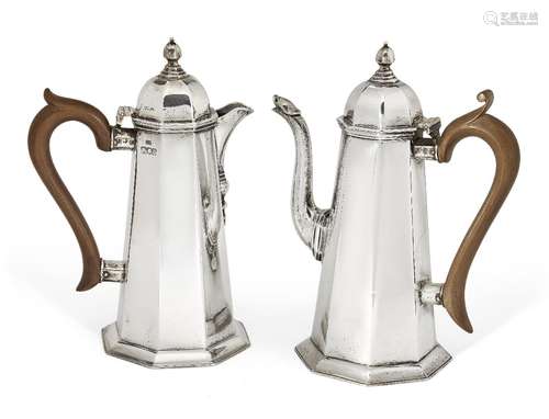 A pair of George V silver café-au-lait pots, London, c.1916, Carrington & Co., of octagonal, faceted