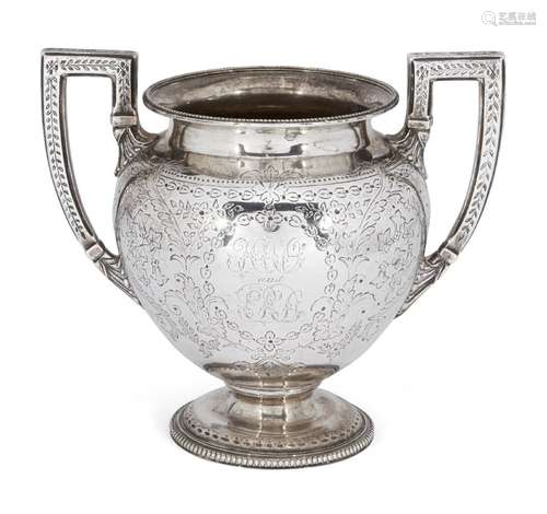 An engraved Victorian silver sugar bowl, London, c.1871, Thomas White, designed as a twin-handled