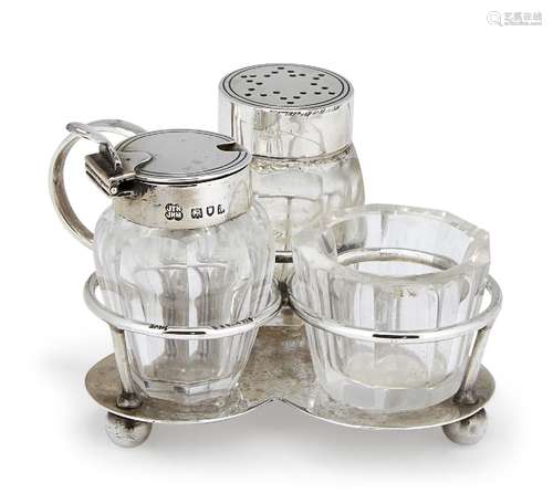 A Victorian silver cruet set, London, c.1896, Hukin & Heath, the small silver stand raised on