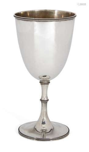 A beaded Victorian silver goblet, London, c.1870, Mappin & Webb, the plain cup with gilded