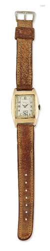 A 9ct gold wristwatch, the rectangular silvered dial with Arabic black numerals, subsidiary dial for