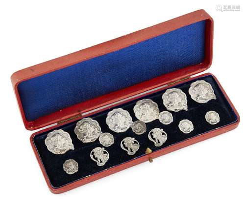 A cased set of twelve Art Nouveau silver buttons hallmarked London, c.1904, each with foreign import