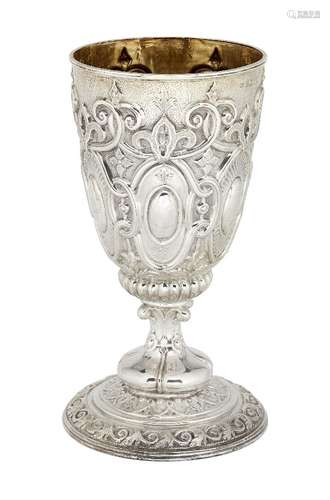 An ornately chased Victorian silver goblet, Sheffield, c.1886, William Padley & Son, the circular