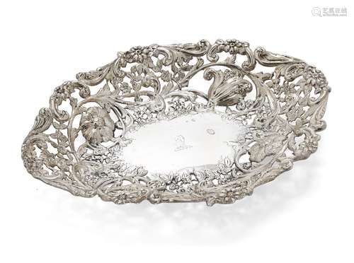 A pierced Victorian silver dish, London, c.1885, Charles Stuart Harris, of oval form, the repousse