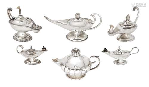 Six various silver and white metal 'Aladdin's Lamp' cigarette lighters, comprising one larger