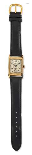 A 9ct gold wristwatch, the rectangular dial with Arabic numerals, alternate baton hour markers,