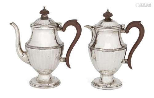 A pair of silver café-au-lait pots, Birmingham, c.1928, Mappin & Webb, the coffee pot and hot milk