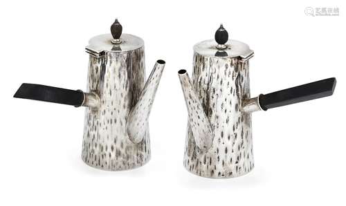 A matched pair of silver café-au-lait pots, Birmingham, c.1898 and 1903, Hukin & Heath, the tapering