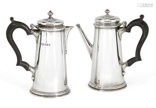 A pair of silver café-au lait pots, London, c.1932 and 1934, Theodore Rossi, of tapering cylindrical